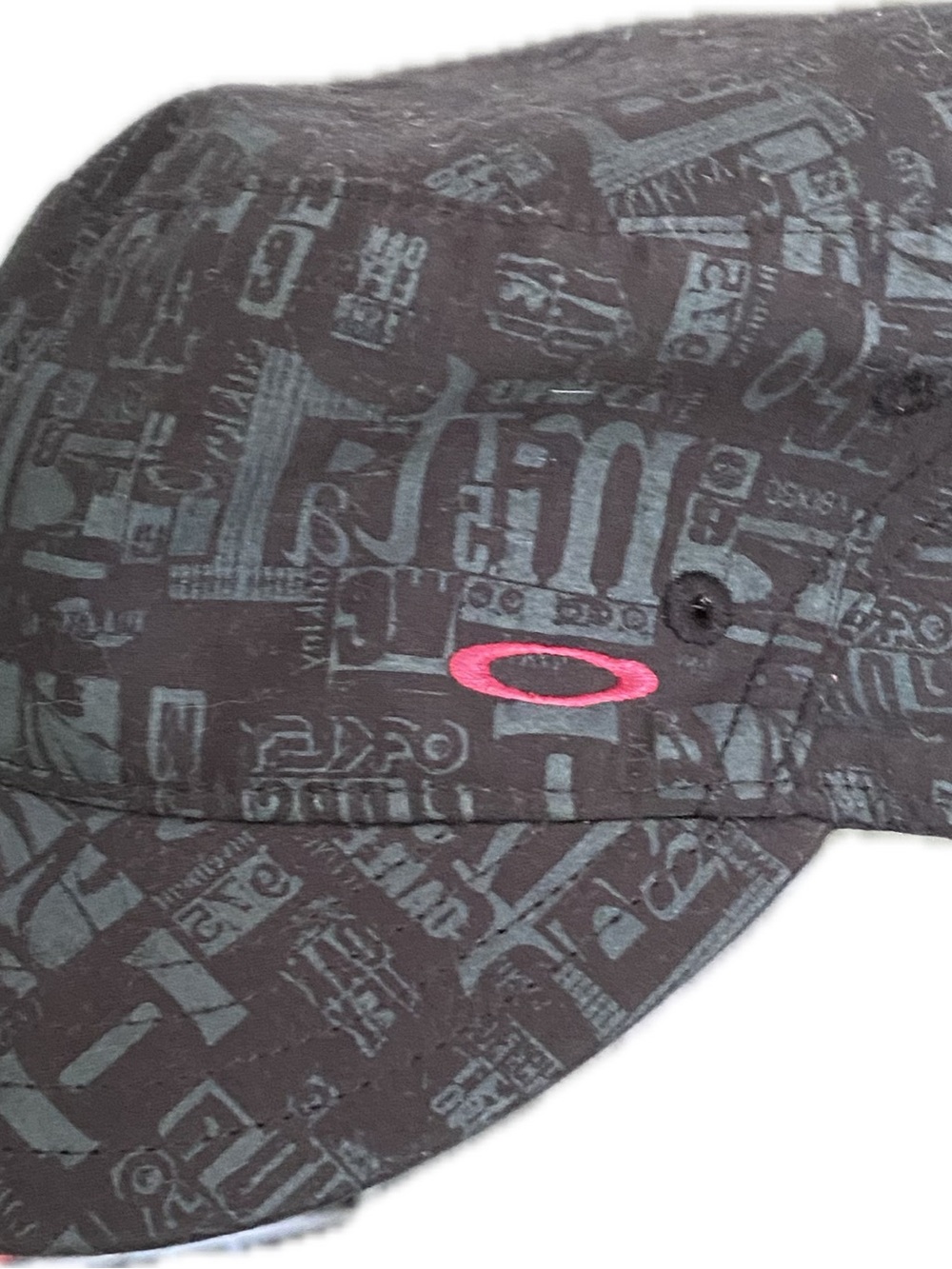 Oakley Convoy Black Hat with Pink Logo and Teal-Gray Graphic Print